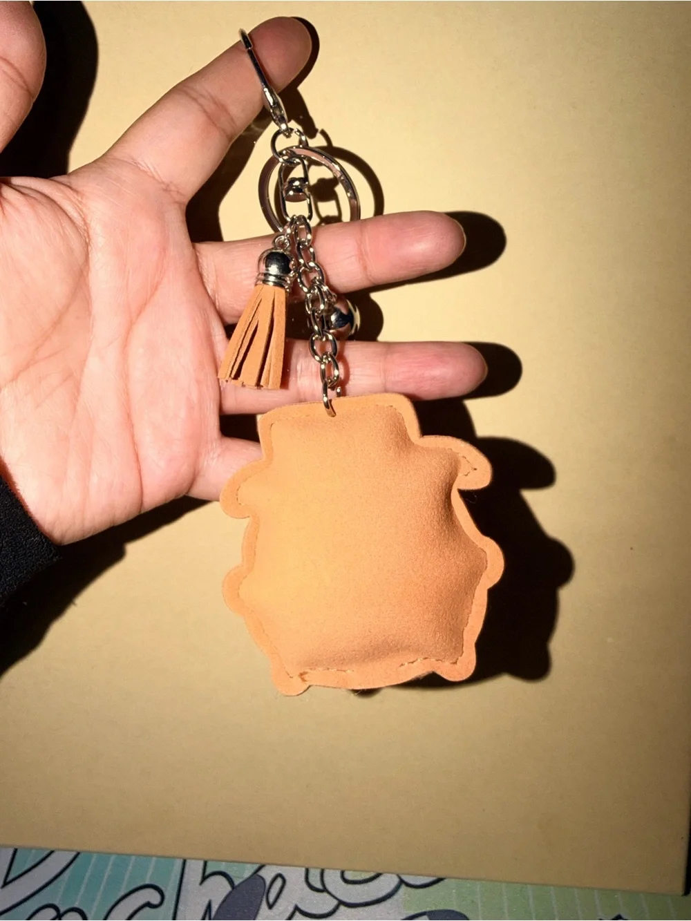 🤠NWOT Crystal Embellished Tan Keychain Charm with Tassel in Woody character